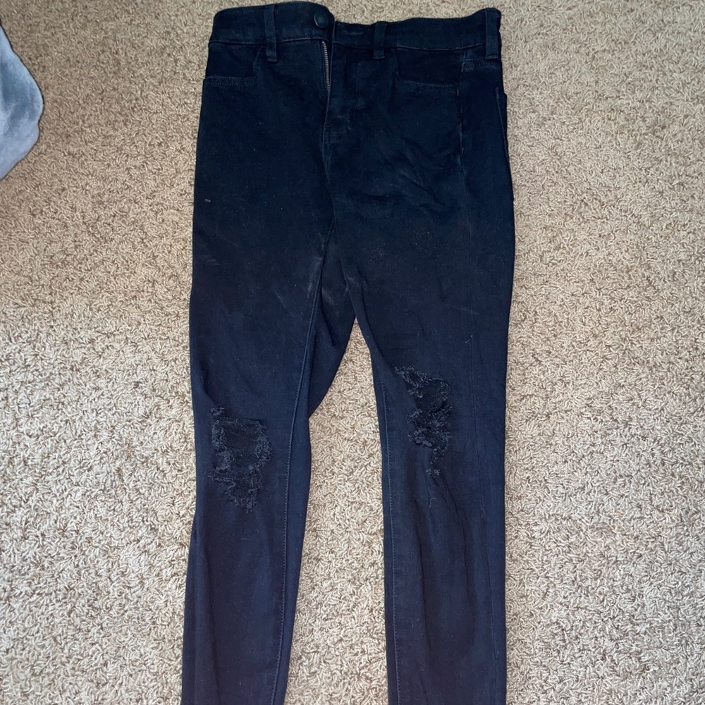 black ripped jeans